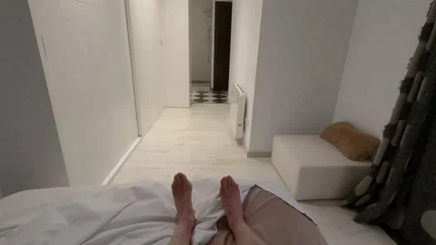 POV shot of man getting out of his bed at home and going into the shower Stock Footage 148340875