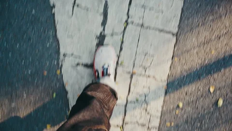 POV Shot of Person Walking the Wrong Way Against Road Arrow Marking Vídeo Stock 328178293
