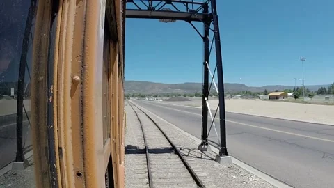 POV shot as retro train is passing near the highway road Stock-Footage 141377501