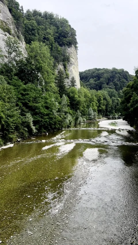 POV Shot of a River with Rocky Cliffs, Vertical Video Stock Footage 341394785