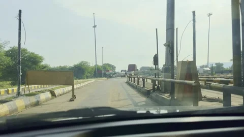 POV shot showing the full process of fast toll collection as a car approaches Stock Footage 317750556