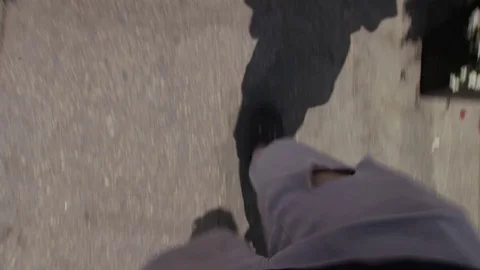 A POV shot of someone walking. Stock Footage 128725799