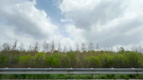 Pov shot through vehicle side window during the highway ride at 80 miles Video stock 190055078