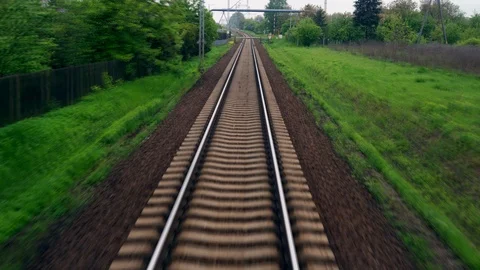 POV Shot of Train Tracks Rolling by In Europe On a Cloudy Day Stock Footage 110779892
