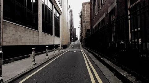 Pov shot of walking along an empty side street Stock Footage 160219717