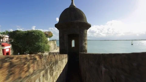POV shot walking owards inside of garita in Old San Juan and then see ocean Stock Footage 81667997