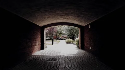 A pov shot of walking through a brick tunnel Stock Footage 160222414