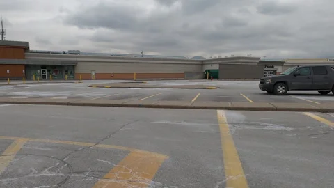 POV side view closed retail shopping mall in COVID 19 pandemic lockdown Video stock 147257515