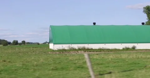 POV side view driving through farms and farmland of Ontario Canada Stock Footage