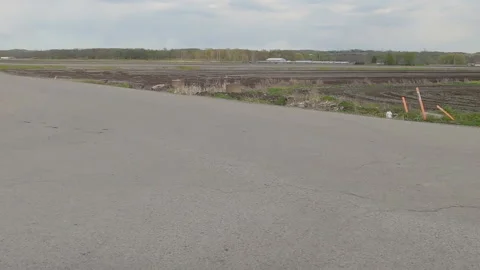 POV side view rich soil and farmland in the Holland marsh of Ontario Vídeo Stock 154331189
