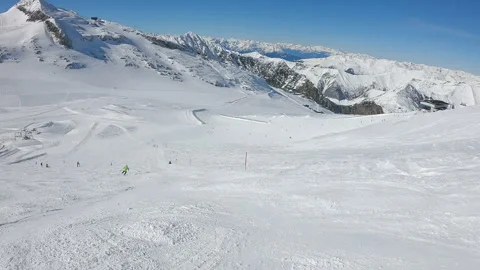 POV of skier going fast down the hill on sunny clear day. Slow motion Stock Footage 330384289