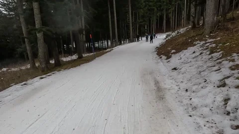 POV Skiing on Narrow Forest Path with Other Skiers, Lack of Snow Stock Footage 328034484