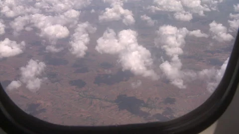 POV of the sky from the inside of an aeroplane Stock Footage 310540175