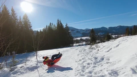 POV sledding down the hill in slow motion in winter day, Zakopane. Stock Footage 152451571