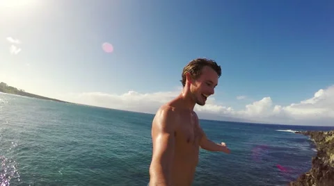 POV Slow Motion Cliff Jumping Backflip. Athletic Young Man Jumping From Cliff Vídeos de archivo 57223619