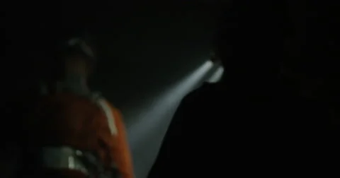 POV slow motion two hikers going through a smoky cave in slow motion Stock Footage 64683389