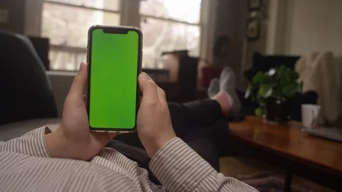 POV smartphone with green screen replacement Stock Footage 129045644