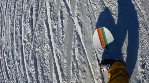 POV Snowboarder having fun while making curves Stock Footage 255042579