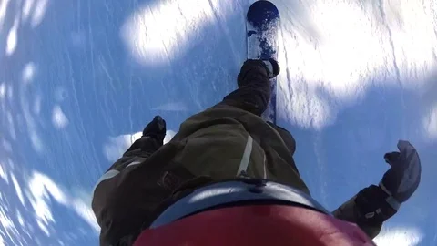 POV of a snowboarder snowboarding downhill at a ski resort, time-lapse. Stock Footage