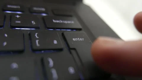 POV of someone pressing the Enter Key non-stop. A person typing the Enter Key Stock Footage 329195677