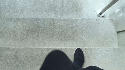 POV. Steel elevator door opens. Feet with black socks and shoes walking down Stock Footage 125200174