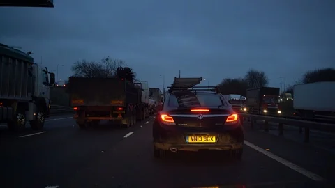 POV of stop start traffic on the M1 motorway early morning, 4k, uk Video stock 86828759