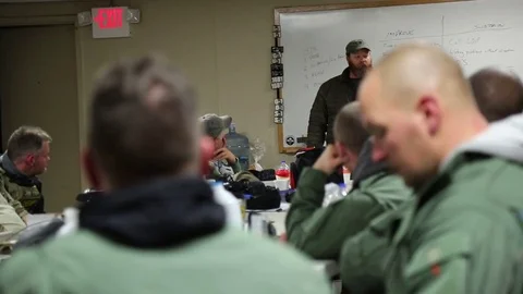 POV of SWAT Trainees with Instructor in Background Stock Footage 70562957