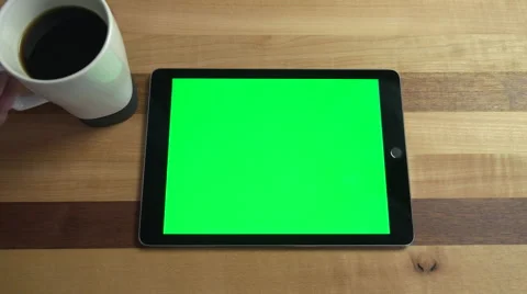 POV  Tablet Green Screen with Coffee Cup on Counter. Video stock 67819723