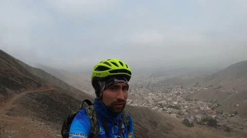 Pov talking to the camera and walking down a narrow path up a steep hill. Stock Footage 145102203