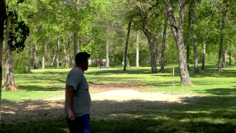 POV: Three disc golfers teeing off on the fairway, and all have bad results Vídeo Stock 156681859