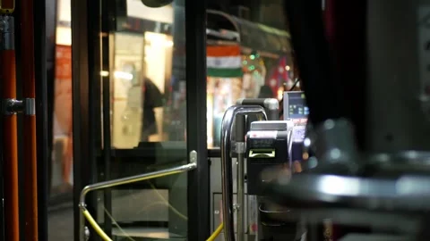 Pov to ticket gate machine at exit door on kyoto public bus while running i.. Stock Footage 276352842