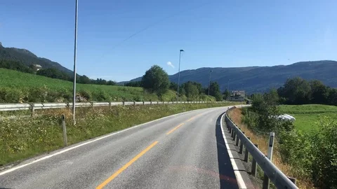 POV Time Lapse View of Mountain, Valley, and Fjord Landscape in Norway Stock Footage 115957162