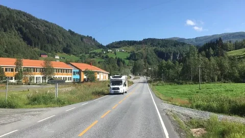 POV Time Lapse View of Mountain, Valley, and Fjord Landscape in Norway Stock Footage 115957169