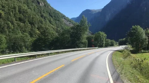 POV Time Lapse View of Mountain, Valley, and Fjord Landscape in Norway Stock Footage 115957181