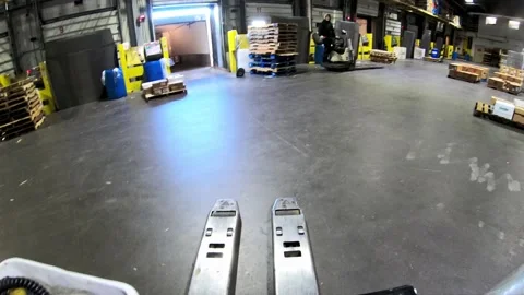 POV timelapse of pallet jack moving delivering packages from truck to Stock Footage 226294078