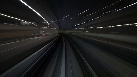 POV Timelapse from tram driving through different stations at night, Tokyo Stock Footage 136134553