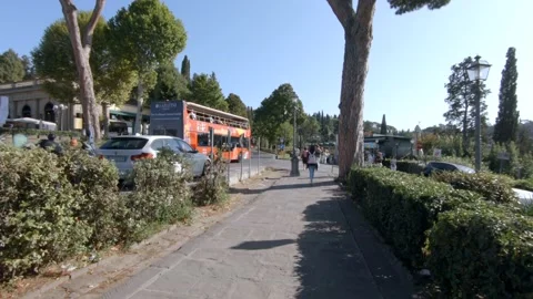 POV - Tourists walking along Viale Galileo sidewalk, Florence, Italy - Europe Stock Footage 139320853
