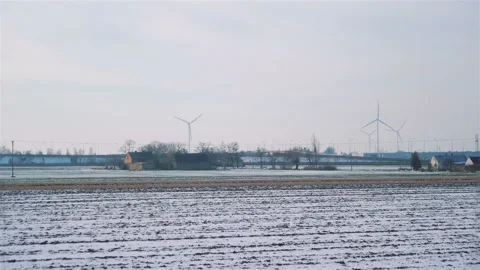 POV from train passing windmills in slow motion 180fps Video stock 109418253