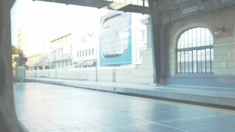 POV train window leaving station Fade to White Dreamy Transition Stock Footage 223488708