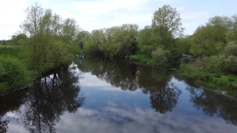 Pov Tree Lined River Tees With Reflections on Water Croft on Tees Stock Footage 192871169