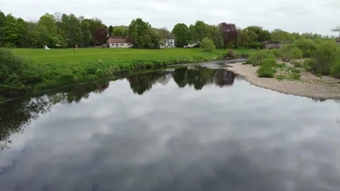 Pov Tree Lined River Tees With Reflections on Water Croft on Tees Stock Footage 192875736