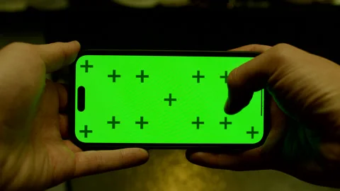 POV of Using Smartphone with Green Screen Stock Footage 319703632