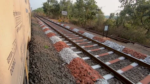 POV video in perspective while travelling at high speed of Indian railways train Stock Footage 140089171