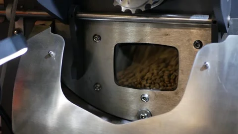POV view of aromatic brown coffee beans while roasting through small checki.. Stock Footage 260862356