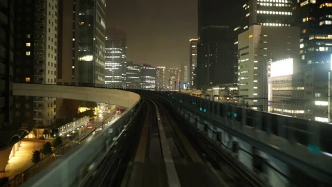 POV View of an Automated Train Running Through a Big City (Real Time) Stock Footage 156277224