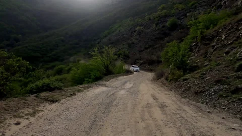 Pov view car driving down mountain road in Sulak Canyon, Dagestan Stock Footage 194683351