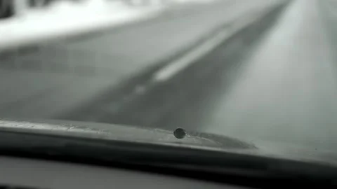 POV view from car interior to windshield sprayer on the hood. Stock Footage 263567398