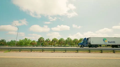 POV view from the driver side in the car on the oncoming lane with a traffic Stock Footage 316283789