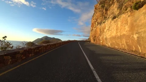 POV view of driving through the famous Chapman's peak drive Видео 158929985