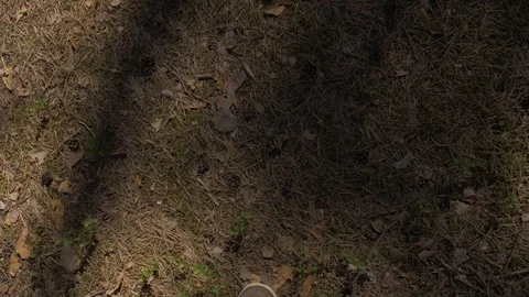 POV The view from the eyes down on a man walking in brown pants and boots with Stock Footage 108247941